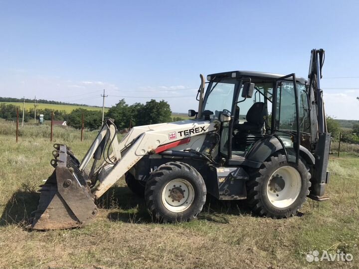 Услуги экскаватора-погрузчика