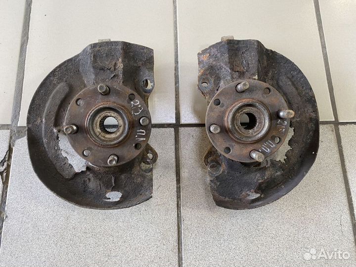 Поворотный кулак Mitsubishi Lancer VII