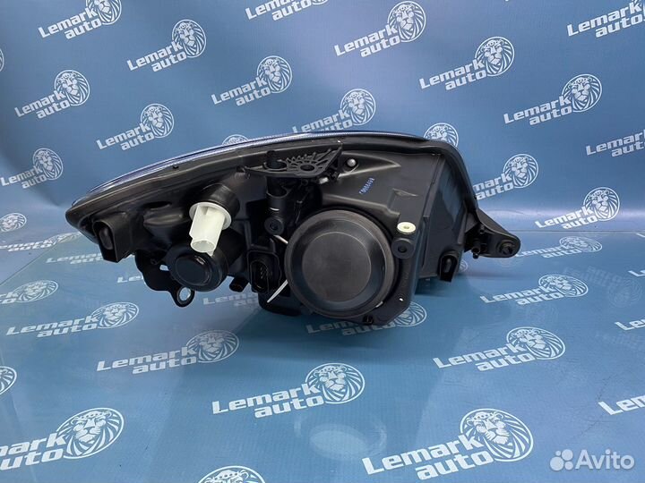 Фара левая Skoda Fabia, Roomster до 2010