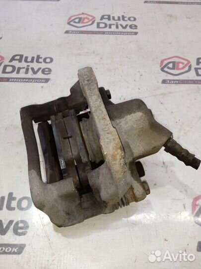 Суппорт тормозной передний правый Renault Logan 1