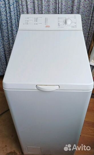 Стиральная машина с вертикальной загрузкой