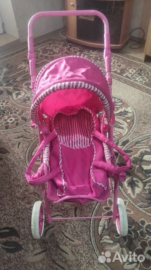 Детская игрушечная коляска