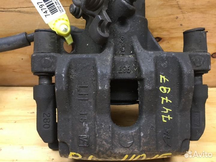 Суппорт лев. зад. mazda axela