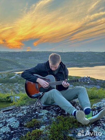 Учитель по гитаре
