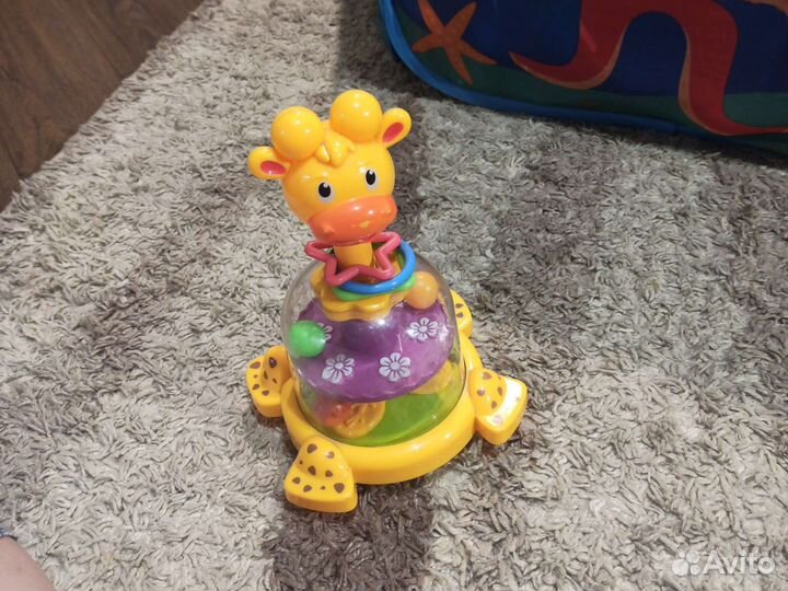 Развивающая игрушка юла вертушка