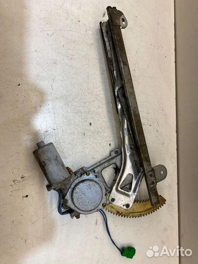 Мотор стеклоподъемника задний правый Subaru