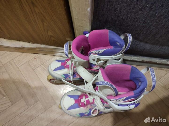 Роликовые коньки