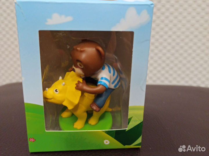 Игрушка Барни на динозавре