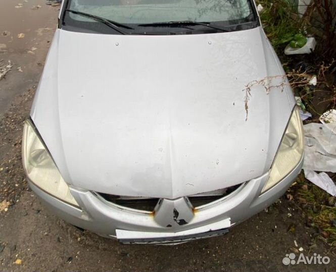 Капот Mitsubishi lancer 9