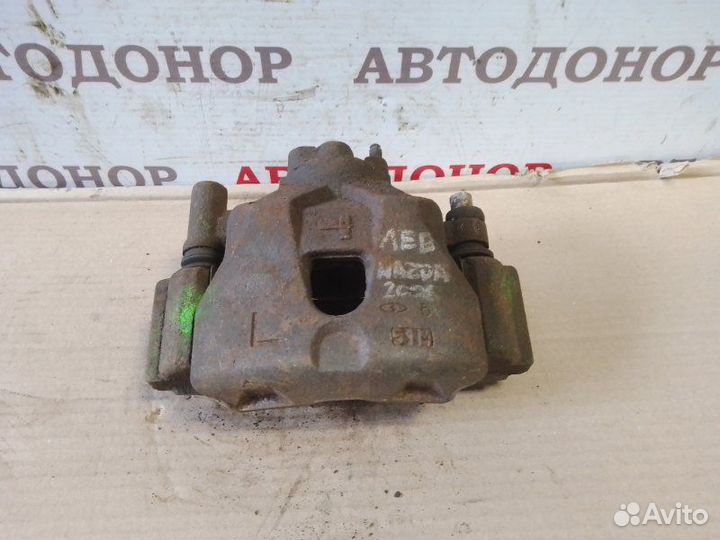 Суппорт тормозной передний левый Mazda 6 GG