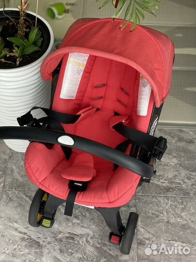 Коляска автокресло doona с базой isofix