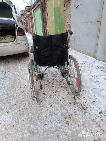 Инвалидная коляска