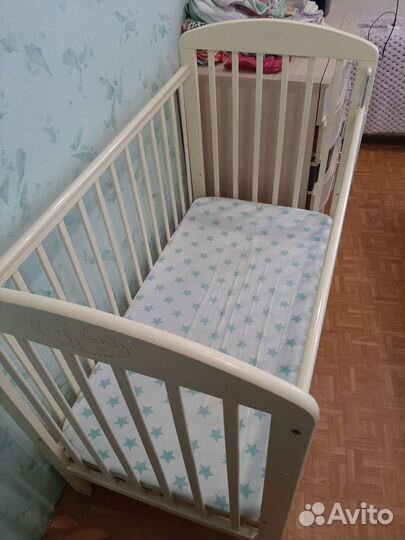 Детская кроватка с поперечным маятником
