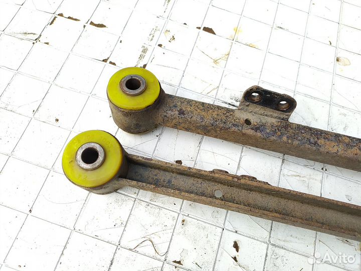 Продольный рычаг задний Мазда Фамилия Хэтчбэк