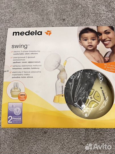 Молокоотсос medela электрический