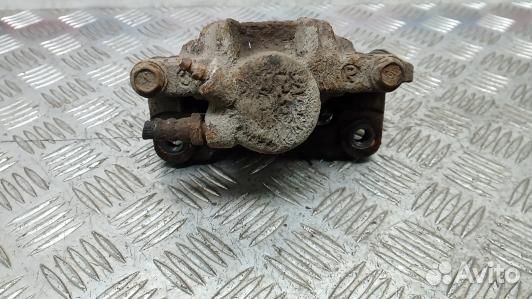 Суппорт тормозной задний правый toyota avensis ver