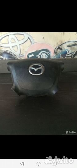 Подушка безопасности в руль Mazda 323