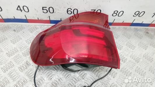 Фонарь задний левый BMW X5 E70 (1NT04MX01)