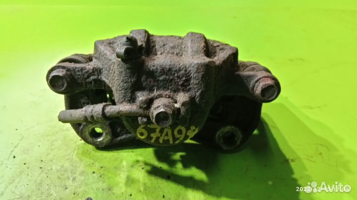 Суппорт передний левый для Kia Rio II 2005 - 2011