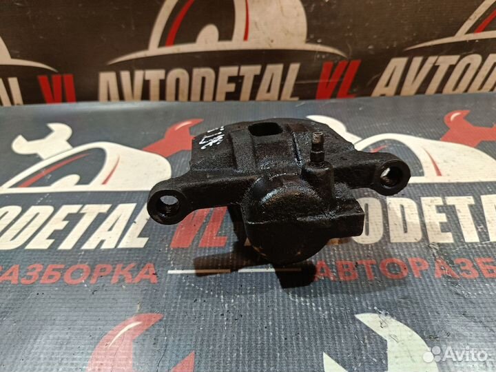 Суппорт задний Mitsubishi Lancer 9