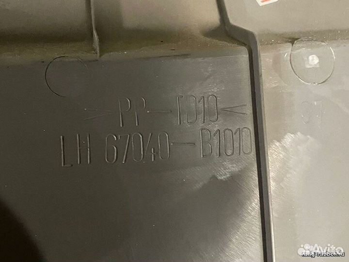 Обивка двери Toyota Passo I задняя левая