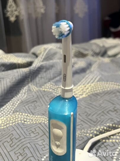 Электрическая зубная щетка braun oral b