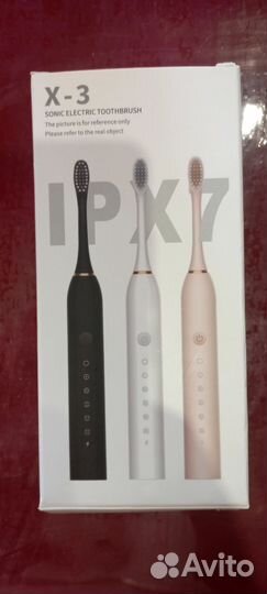 Электрическая зубная щетка