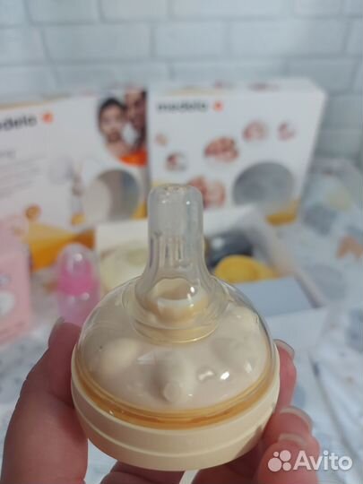 Молокоотсос medela swing электрический