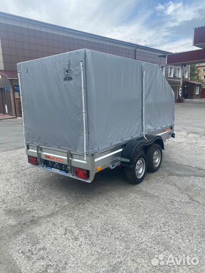 Прицеп легковой от официального дилера. С тентом