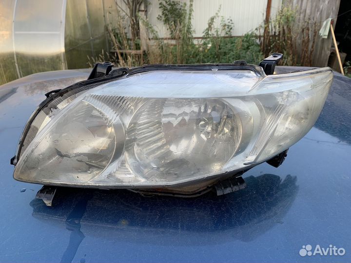 Фара передняя левая toyota corolla е150