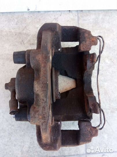 Суппорт тормозной передний левый Opel Vectra B