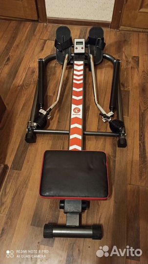 Гребной тренажер новый