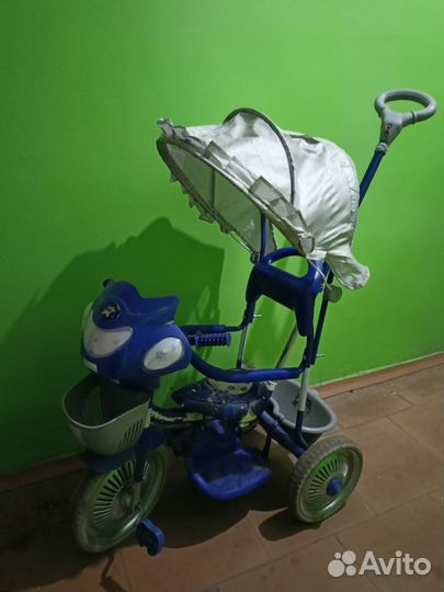 Трехколесный велосипед с ручкой