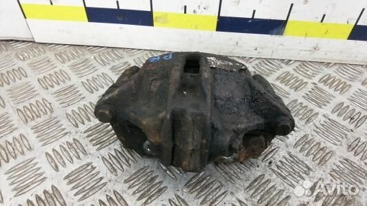 Суппорт тормозной передний правый citroen C3 picas