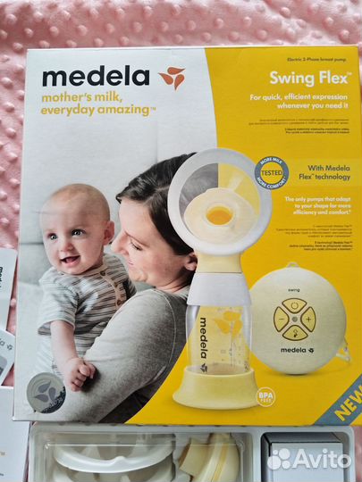 Молокоотсос medela электрический