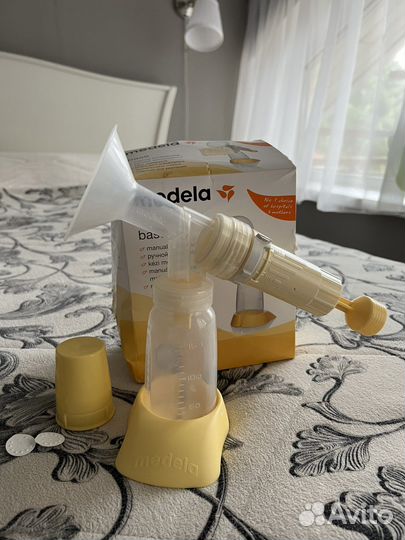 Молокоотсос medela ручной