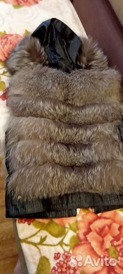 Жилетка меховая женская
