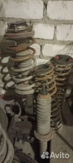 Пружина в сборе с амортизатором ваз 2112