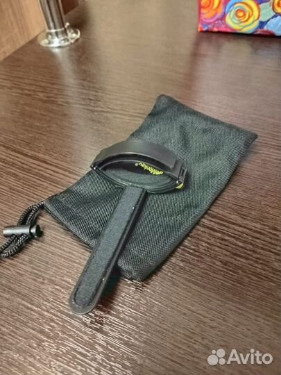 Зажим для контроля схода лески со шпули