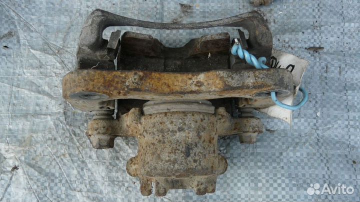 Суппорт торм пер правый Mitsubishi Lancer Cedia