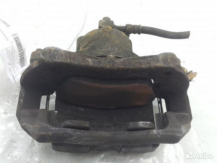 Суппорт тормозной передний правый Opel Astra