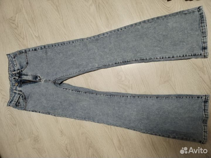 Джинсы клеш