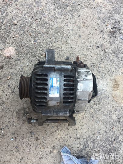 Генератор на Мазда 90А 101211-7240 denso