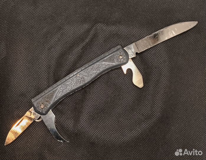 Нож СССР складной 4-х предметный серый