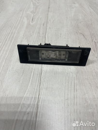 Фонарь подсветки номера для Bmw F20