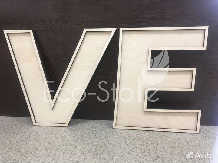 Буквы из мха. Логотип из мха