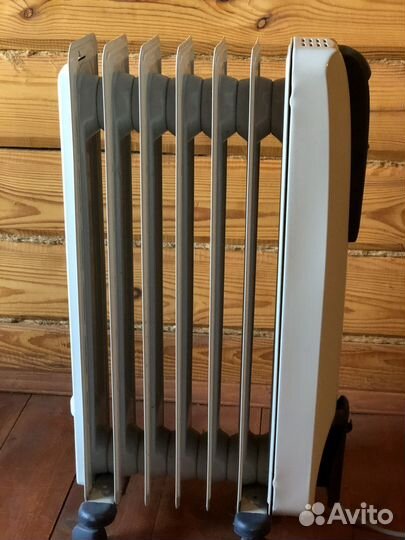 Масляный обогреватель delonghi