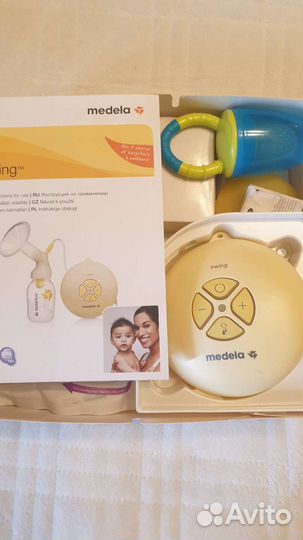 Молокоотсос medela электрический