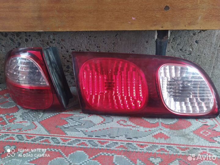Фонарь левый тайота
