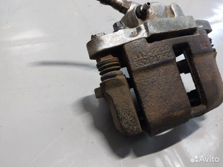 Тормозной суппорт передний правый Ваз Калина